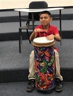 Fifth grader playing drum 